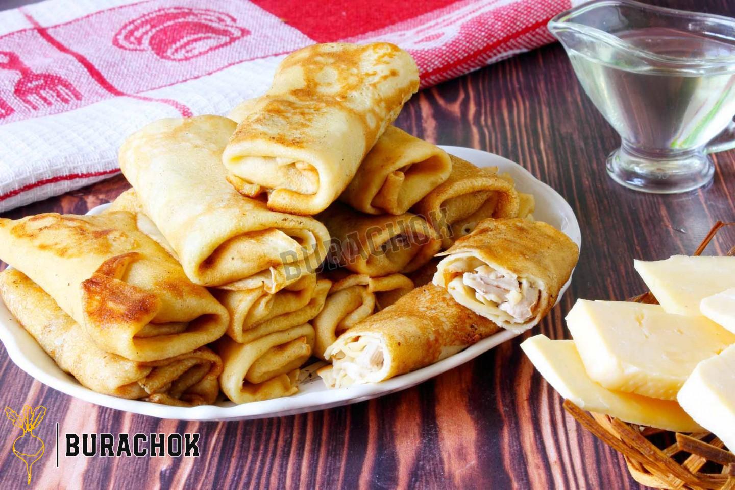 Млинці з куркою, грибами та сиром