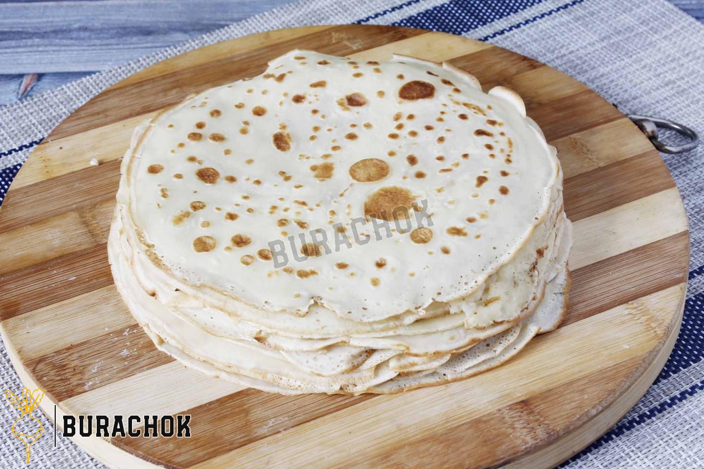 Млинці з куркою, грибами та сиром