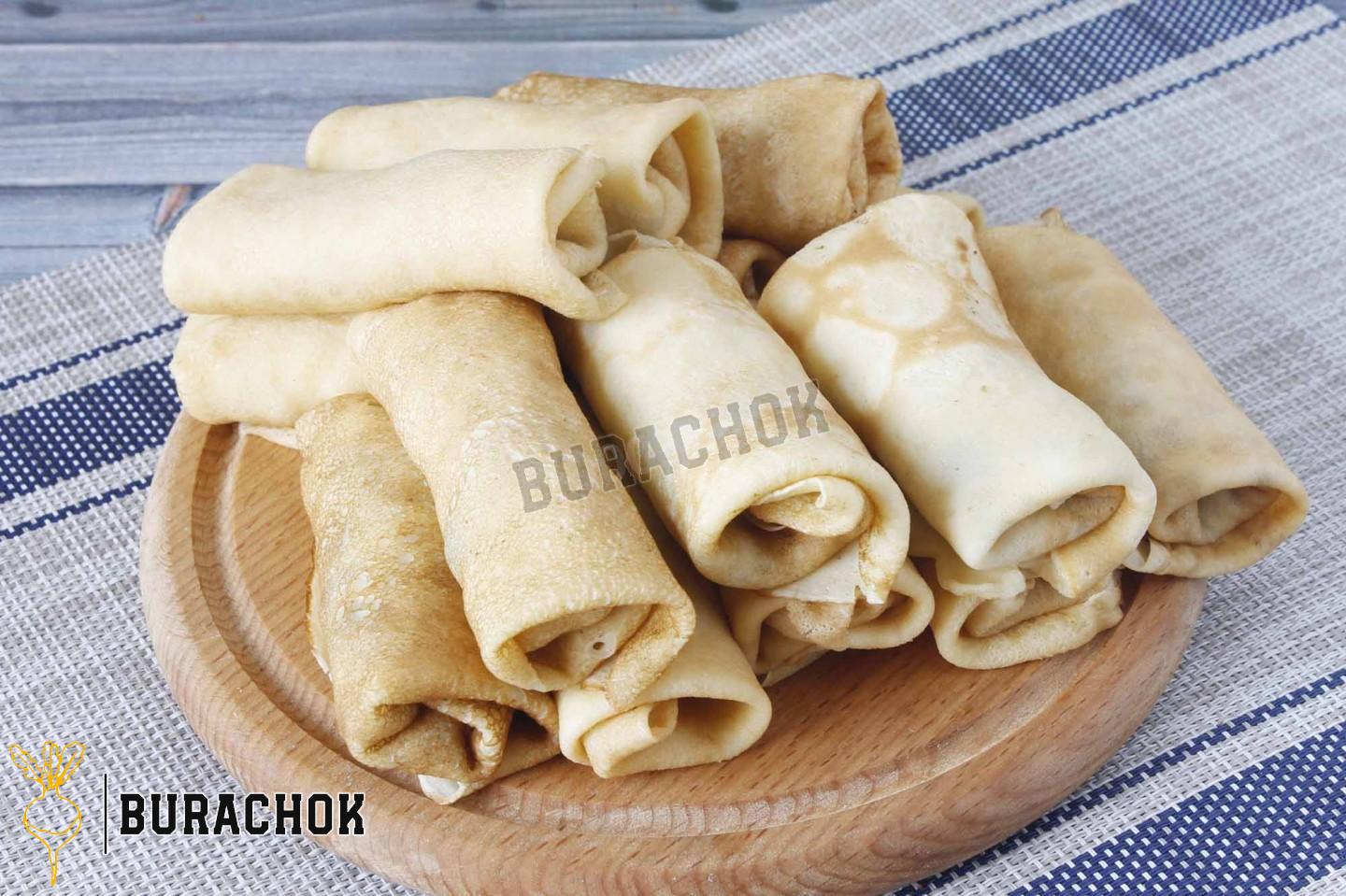Млинці з куркою, грибами та сиром